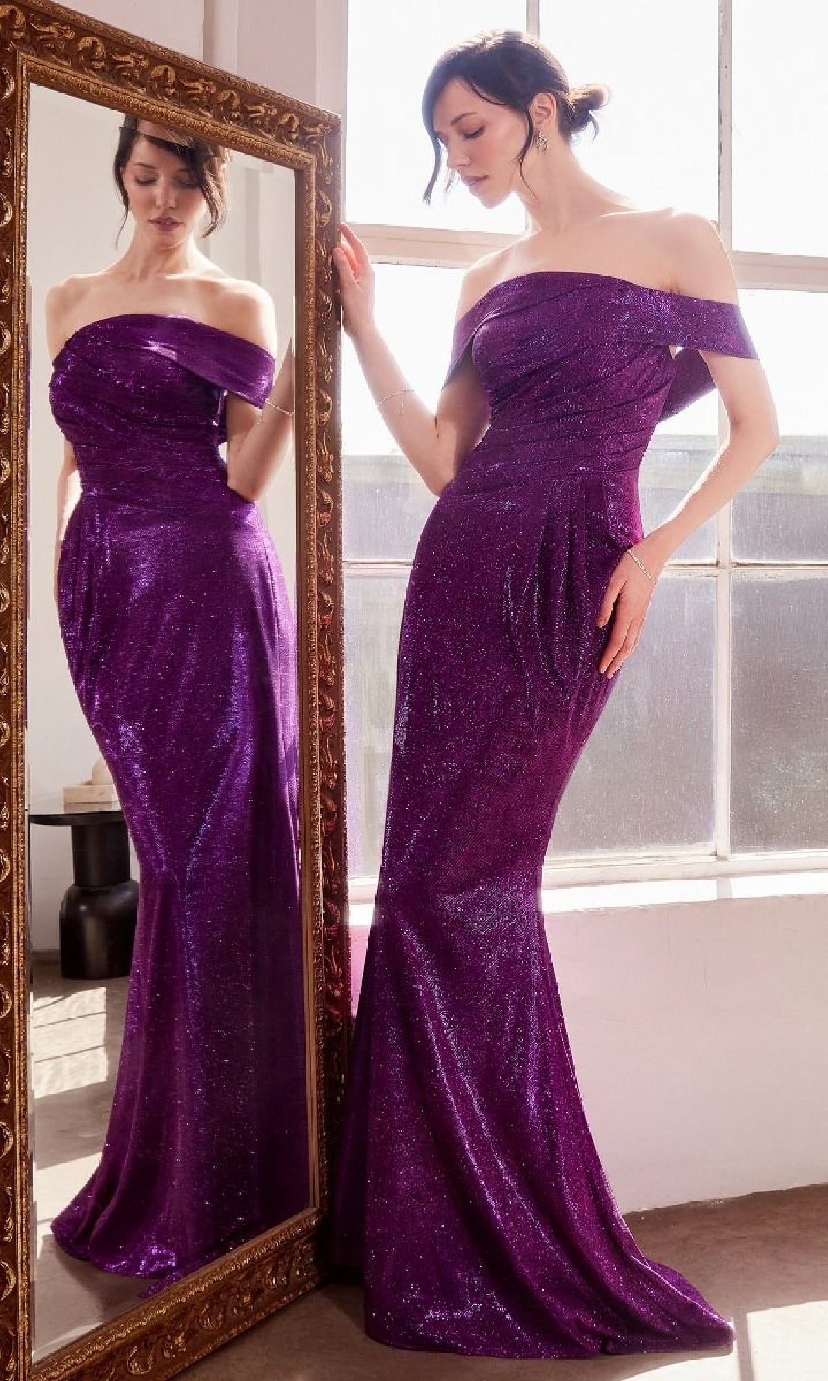 A woman wearing the Off-Shoulder Long Glitter Prom Dress: Amoris T603 with a mermaid skirt stands beside a mirror, her full-length reflection visible in a bright, well-lit room.